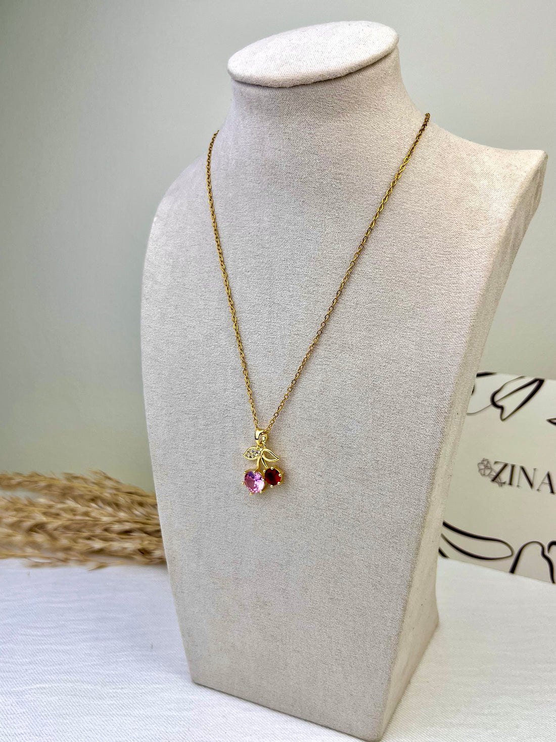 Pink and gold cherry blossom necklace with gemstones