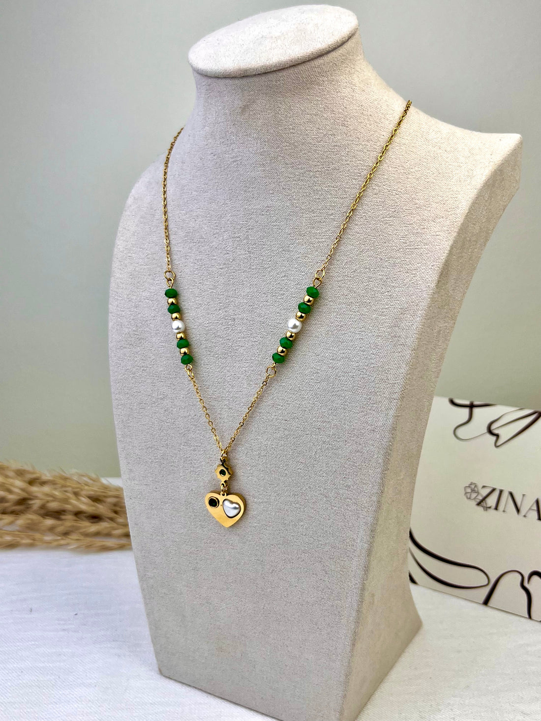Necklace studded with green beads