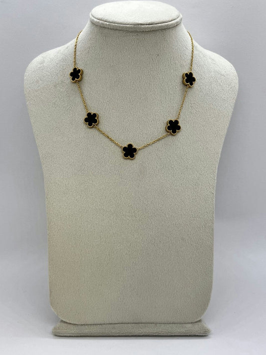 A continuous chain of black flowers