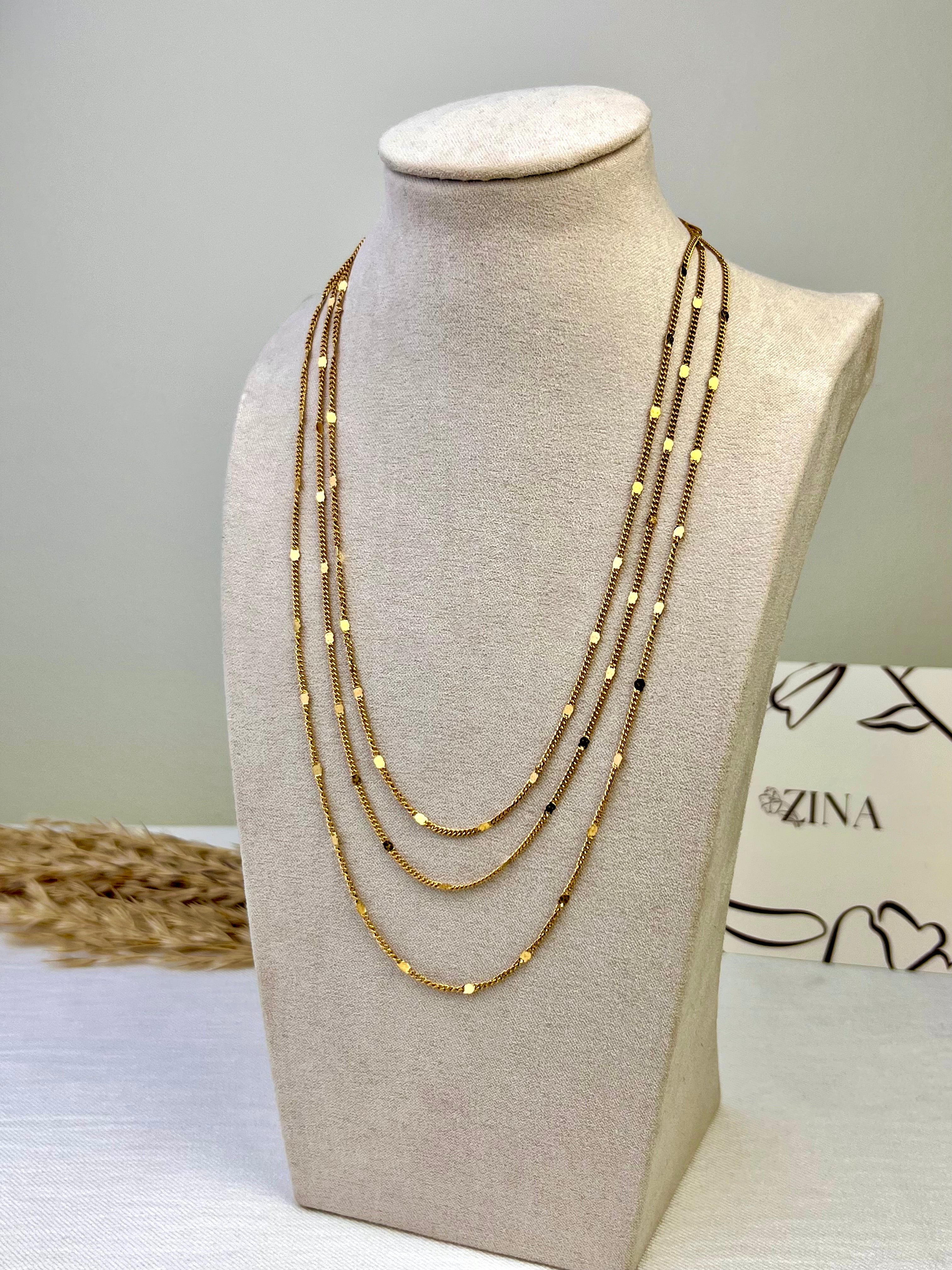 Three-tiered gold necklace