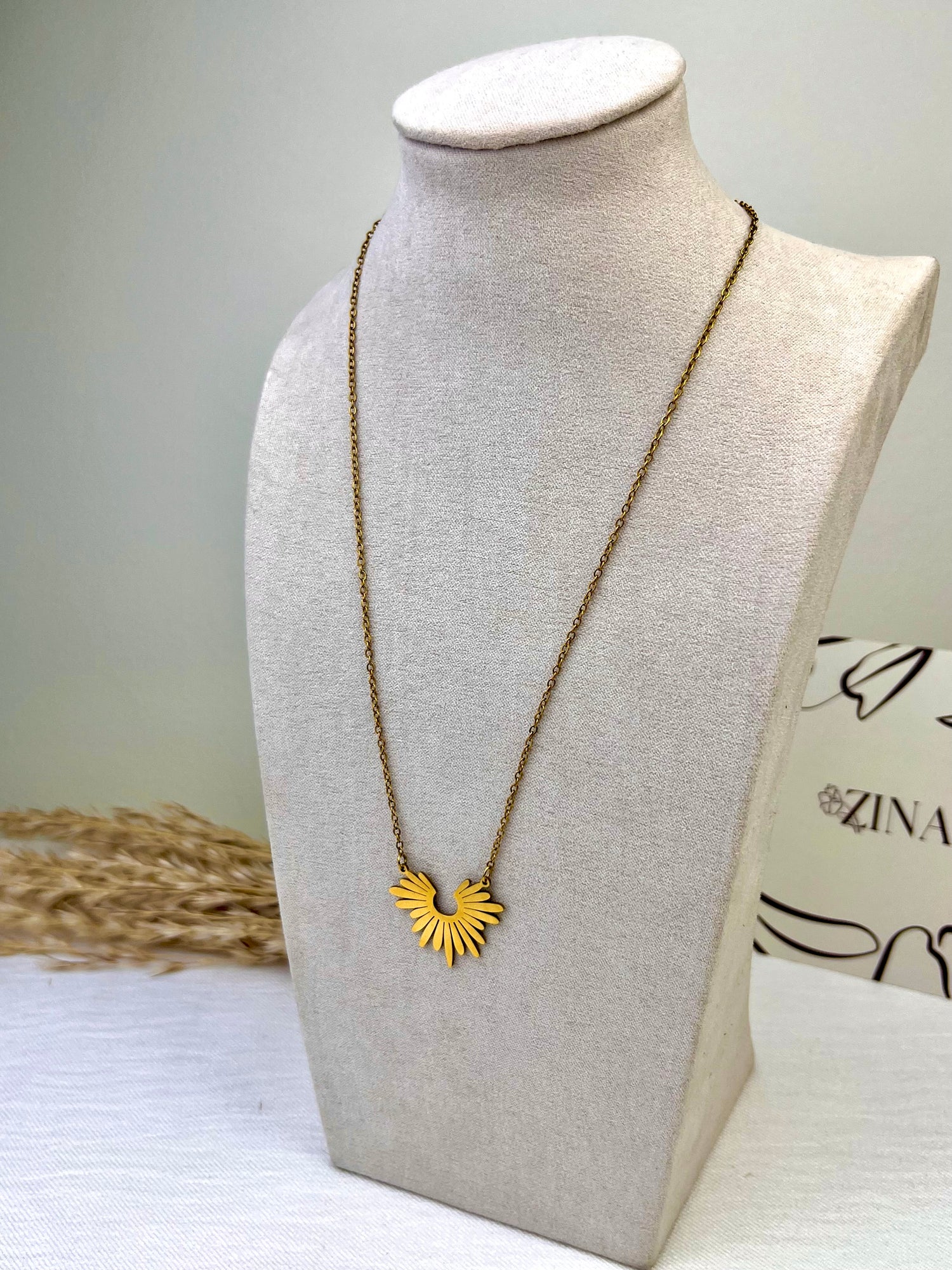 Large half sun gold pendant