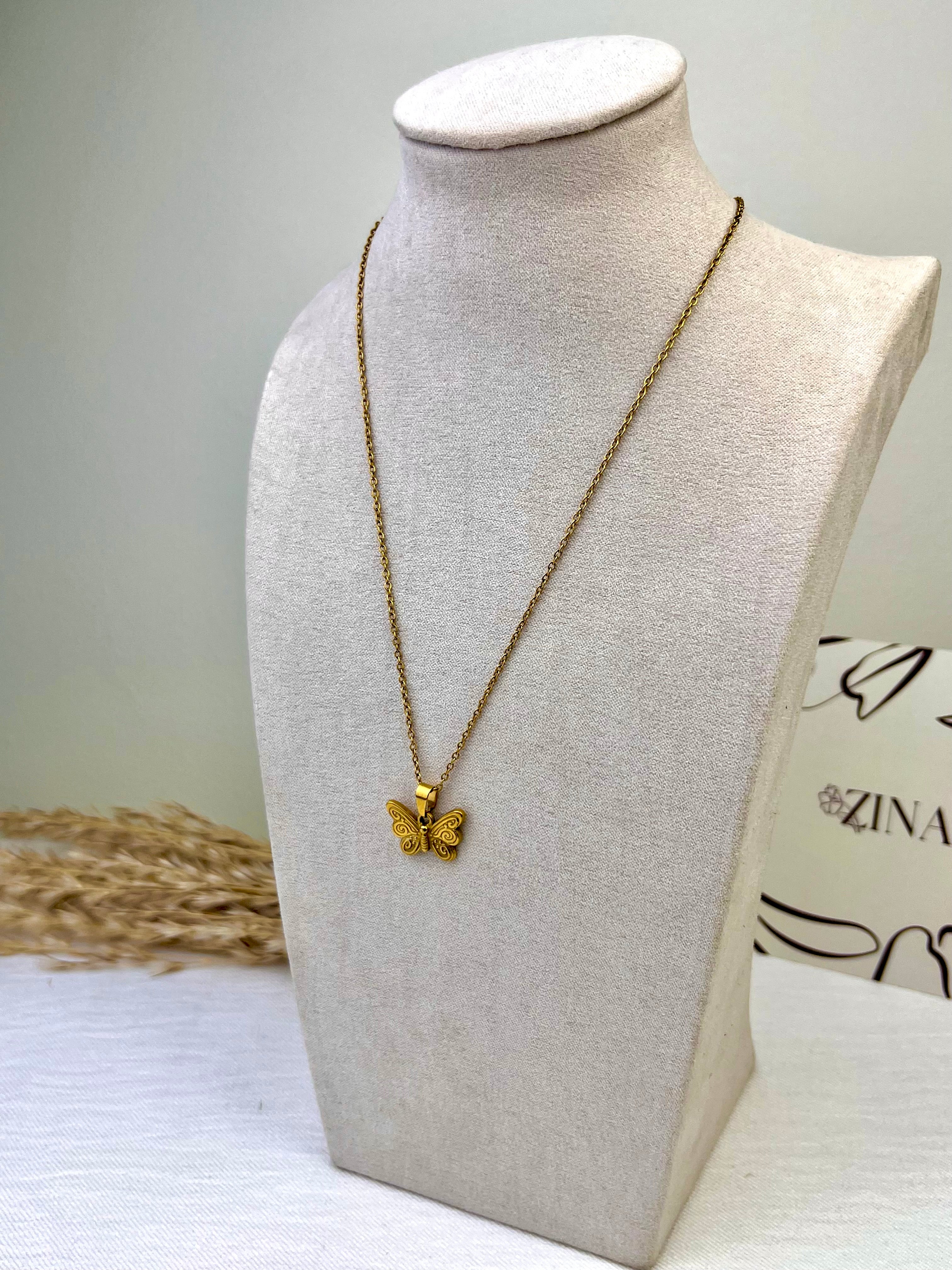 decorative gold butterfly pendant