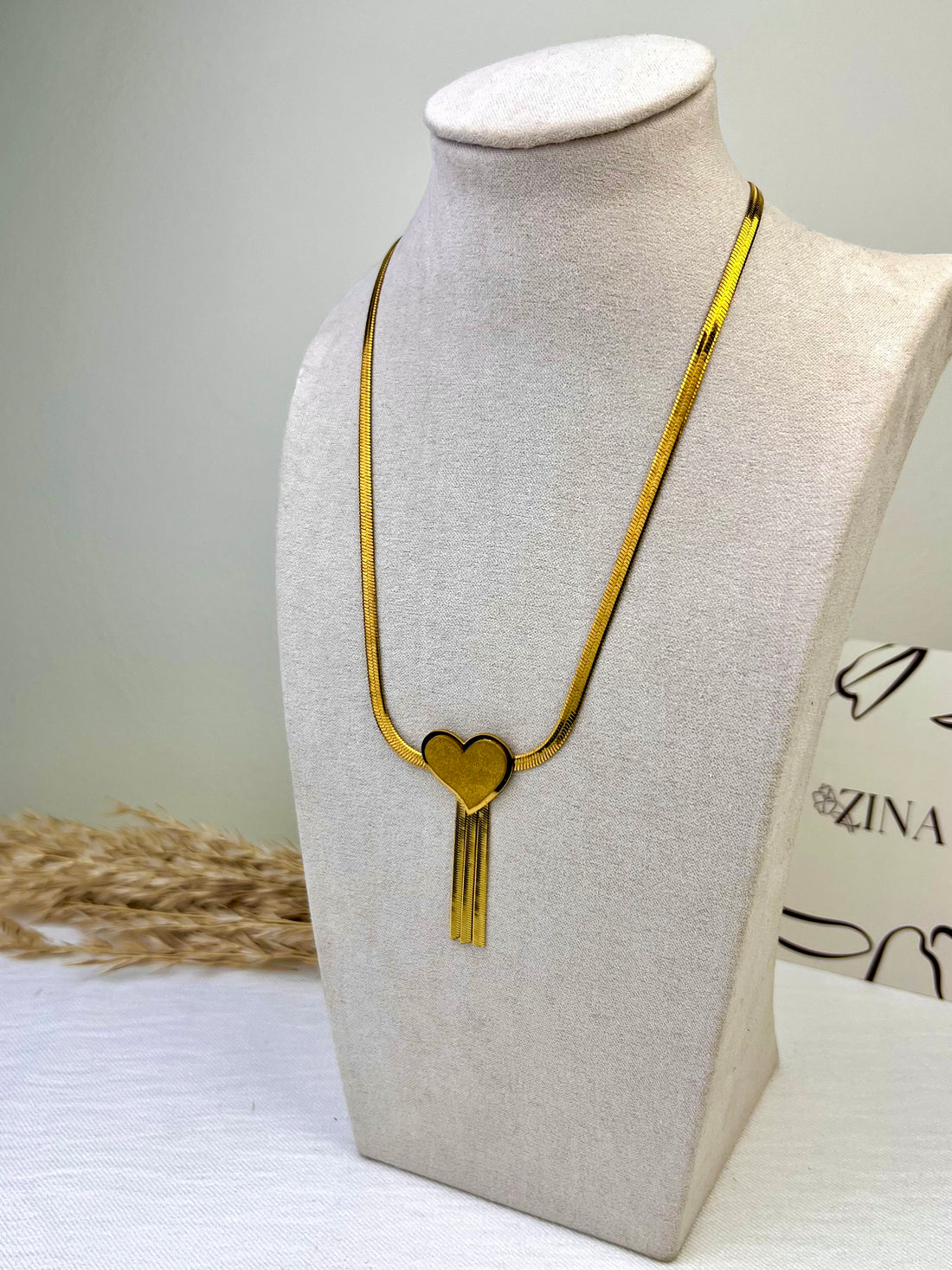 Cobra chain with metal heart and tassels