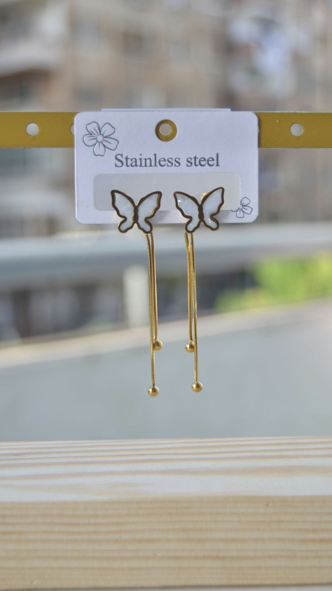 White enamel butterfly earrings and pendants