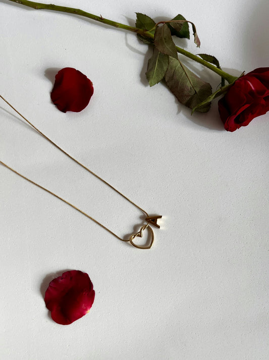 Empty heart pendant and small letter