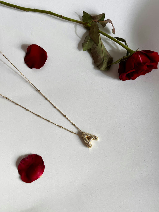 Letter necklace lined with rhinestones